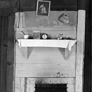 ALABAMA: FIREPLACE, c1935. Fireplace in a bedroom of sharecroppers shack in Hale County, Alabama
