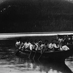 ALASKA: DUGOUT CANOES, 1887. Tlingit Native American men paddling dugout canoes