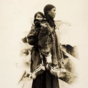 ALASKA: INUIT, 1903. An Inuit mother and child. Photograph, 1903