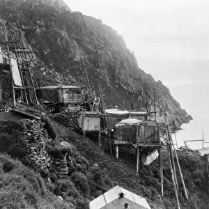 ALASKA: KING ISLAND. A view of the sea cliff dwellings in the village of Ukivok