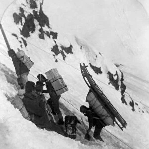 ALASKA: MINERS, c1898. Miners climbing a mountain near the summit of Chilcoot Pass
