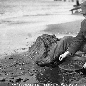 ALASKA: MINING, c1915. A prospector panning for gold in Nome, Alaska. Photograph, c1915