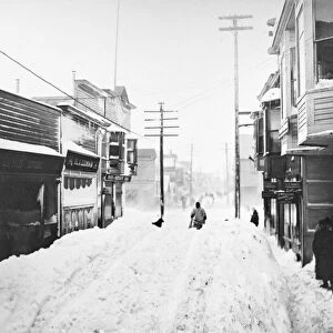 ALASKA: NOME, 1907. A main street in Nome, Alaska, after a heavy snow during the