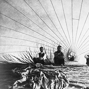 American aeronauts John G. Doughty and Alfred E. Moore photographed with two assistants inside their hot air balloon before a flight over Connecticut, 1886