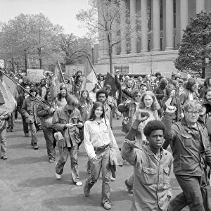 ANTI-WAR PROTEST, 1971. Men and women at an anti-war protest in front of the Department