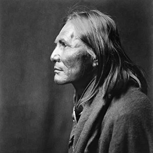 APACHE MAN, c1906. Alchise, an Apache Native American. Photograph by Edward Curtis, c1906