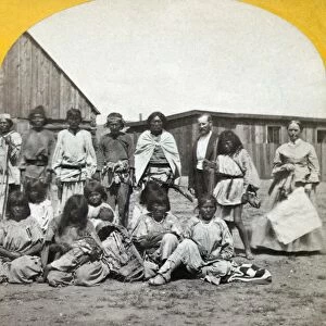 ARIZONA: APACHES, c1873. Group of Coyotero Apaches and their agent at Camp Apache, Arizona
