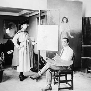 ARTIST AND MODEL, c1905. American actress Beatrice Swanson in the studio of Penrhyn Stanlaws