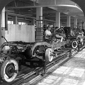 AUTOMOBILE FACTORY, c1929. Assembly line at an automobile factory in Detroit, Michigan