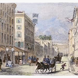 BALTIMORE, 1856. Street scene in Baltimore, Maryland. Wood engraving, English, 1856