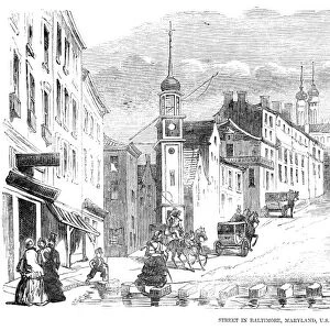 BALTIMORE, MARYLAND, 1856. Street scene in Baltimore. Wood engraving, English, 1856