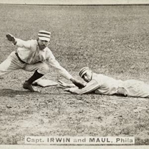 BASEBALL GAME, c1887. Arthur Albert Irwin (left) tags out Albert Joseph Maul on a baseball card while both were playing with the Philadelphia Quakers / Phillies, c1887