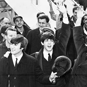 THE BEATLES, 1964. The Beatles arriving at John F. Kennedy Airport in New York City