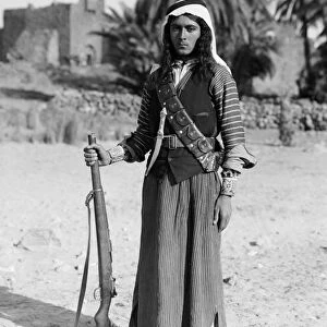 BEDOUIN YOUTH, c1926. A young Bedouin and Druze refugee at Azraq, Jordan. Photograph, c1926