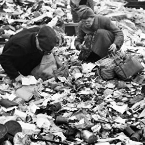 BERLIN, 1945. Women searching for food in a garbage dump in Berlin, Germany