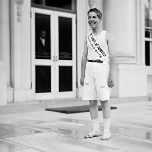 BOY SCOUT, 1913. Fred Reed, preparing for a relay race that starts at the White