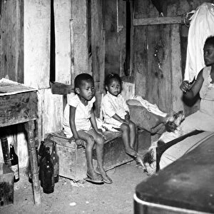 BRAZIL: FAVELA, 1955. The interior of a favela (slum dwelling) in a suburb of Rio de Janeiro, Brazil. Photographed in 1955