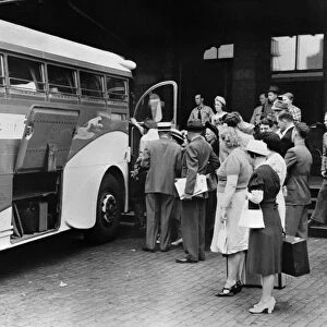 BUS STATION, 1940. People waiting to board a bus at the Greyhound bus station in Harrisburg