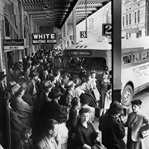 BUS TERMINAL, 1943. Passengers in the whites only waiting area at the Greyhound