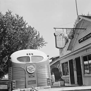 BUS TRAVEL: REST STOP, 1943. A Greyhound bus at a rest stop in Indiana