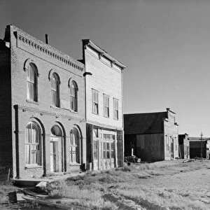 CALIFORNIA: BODIE, 1962. Abandoned buildings along Main Street in the ghost town of Bodie