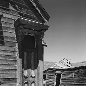 CALIFORNIA: BODIE, 1962. The Johl home, left, in ruins in the ghost town of Bodie