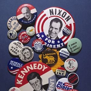 CAMPAIGN BUTTONS. An assortment of buttons from 20th century American presidential campaigns