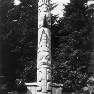 CANADA: HAIDA TOTEM POLE. Totem pole at the front of a house in the Haida village