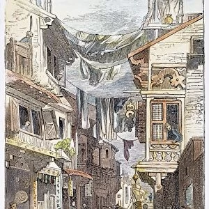 CANTON, CHINA, 19th CENTURY. A street scene in Canton, China. Wood engraving, late 19th century