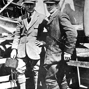 Captain John Alcock and Lieutenant Arthur Whitten Brown beside the modified Vickers-Vimy biplane in which they made the first nonstop transatlantic flight, Newfoundland to Ireland, 14-15 June 1919