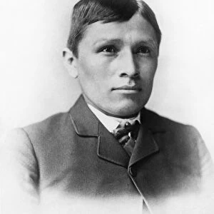 CARLISLE STUDENT, 1885. Tom Torlino, a Navajo Native American student at the Carlisle