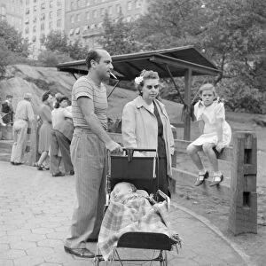 CENTRAL PARK ZOO, 1942. A family in the Central Park Zoo in New York City