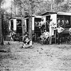 CHAIN GANG, 1910. A convict chain gang in a mobile prison wagon in North Carolina