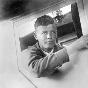 CHARLES LINDBERGH (1902-1974). American aviator. In the cabin of The Spirit of St