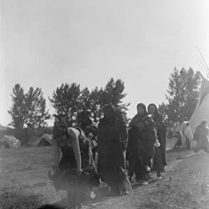 CHEYENNE DANCERS, c1910. Cheyenne participants in the sun dance ceremony leaving