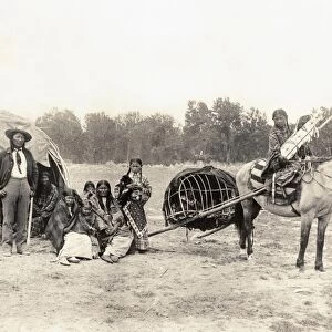CHEYENNE FAMILY, 1889. Stump Horn, a Northern Cheyenne scout, and his family