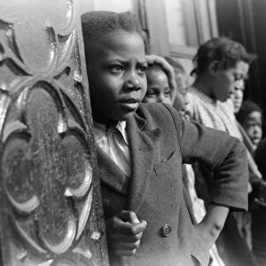 CHICAGO: CHILDREN, 1941. African American children in front of an apartment building