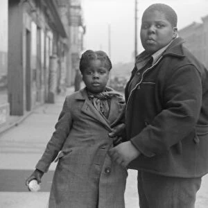 CHICAGO: CHILDREN, 1941. African American children on a street in Chicago, Illinois