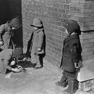 CHICAGO: CHILDREN, 1941. Black and white children playing together on the street