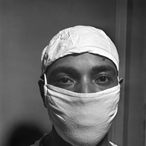 CHICAGO: DOCTOR, 1941. Dr. S. J. Jackson preparing to go into the operating room