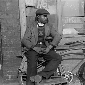CHICAGO: MAN, 1941. Portrait of an African American man in front of a storefront in Chicago