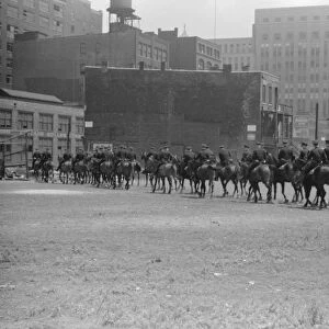 CHICAGO: MOUNTED POLICE. Mounted police in Chicago, Illinois. Photograph by John Vachon