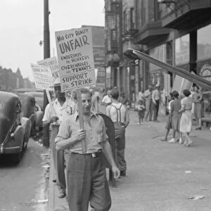CHICAGO: PICKET LINE, 1941. Picketers outside of the Mid-City Realty Company