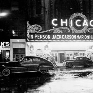 CHICAGO: THEATER, 1949. People arriving at a movie theater for a show starring