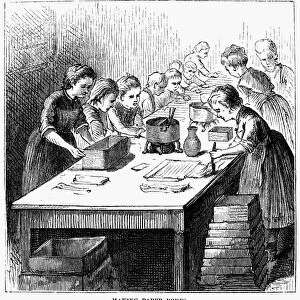CHILD LABOR, 1873. Children making paper boxes in a New York City factory. American wood engraving, 1873