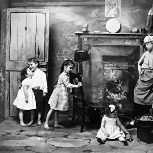 CHILDREN PLAYING, 1902. Staged photograph, American, 1902, by Fritz W. Guerin