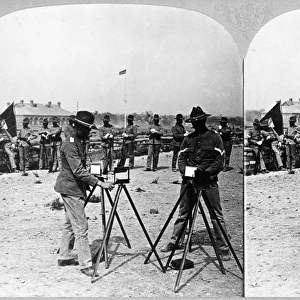 CHINA: BOXER REBELLION. U. S. soldiers sending messages via heliograph from the