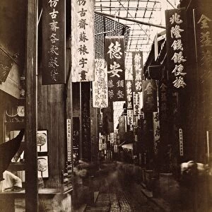 CHINA: CANTON. A street in Canton, China. Photograph, late 19th century