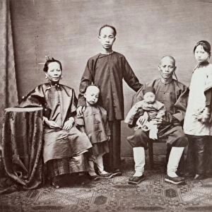 CHINA: FAMILY, 1860s. A shopkeeper and his family, Canton, China. Photographed by M