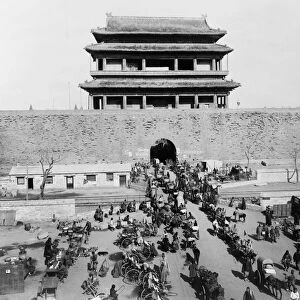 CHINA: PEKING, c1900. A aerial view of busy street scene in front of Hata-men Gate, Peking, China